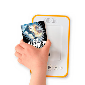 A hand holding the audiobook card for Alex Rider : Point Blanc beside a Voxblock audiobook player