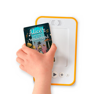 A hand holding the audiobook card for Alice's Adventures in Wonderland beside a Voxblock audiobook player