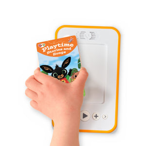 A hand holding the audiobook card for Bing Playtime Stories and Songs beside a Voxblock audiobook player