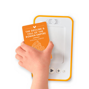 A hand holding the audiobook card for Decline and Fall of the Roman Empire Vol.1 beside a Voxblock audiobook player