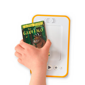 A hand holding the audiobook card for The Gruffalo beside a Voxblock audiobook player