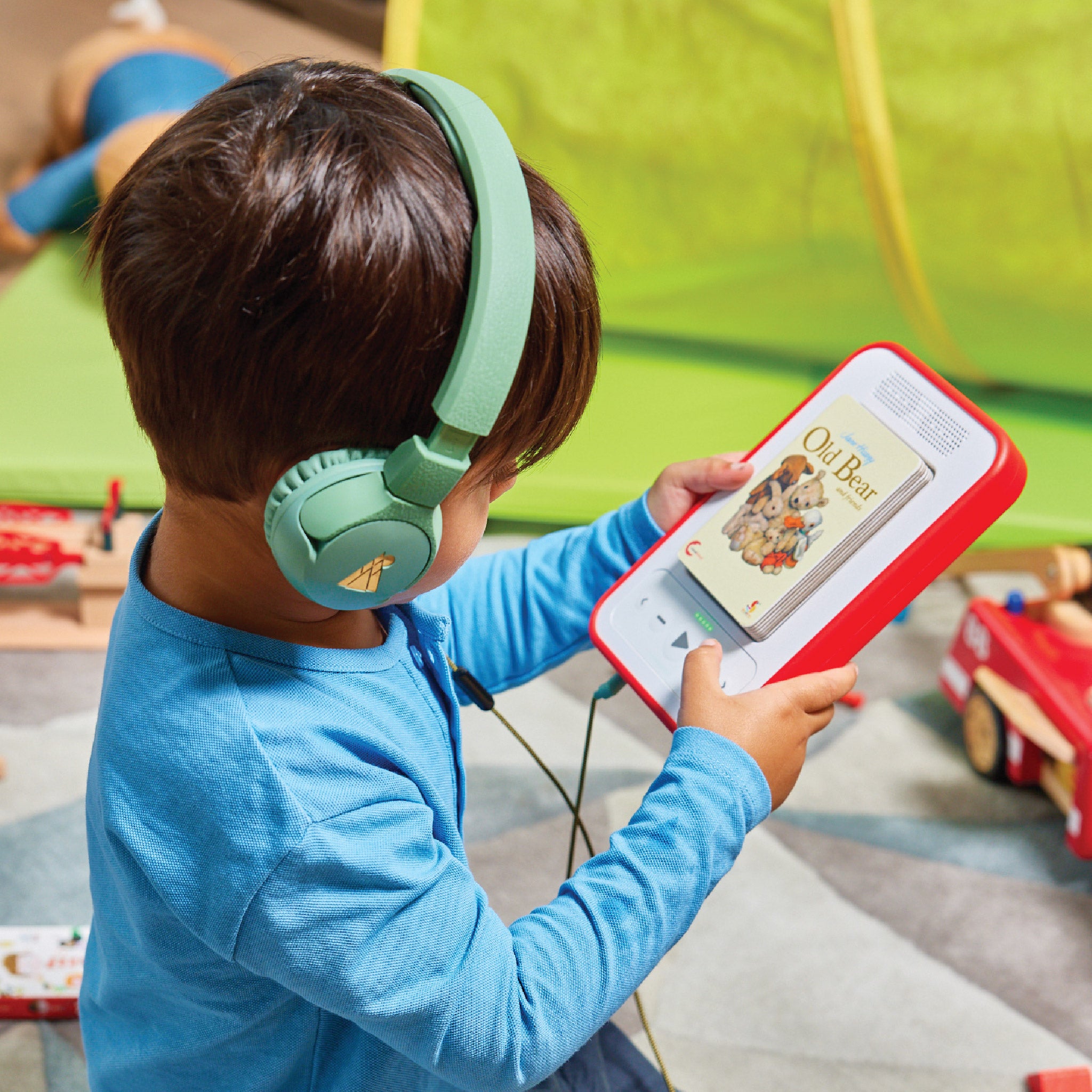 Boy listens to audiobook independantly