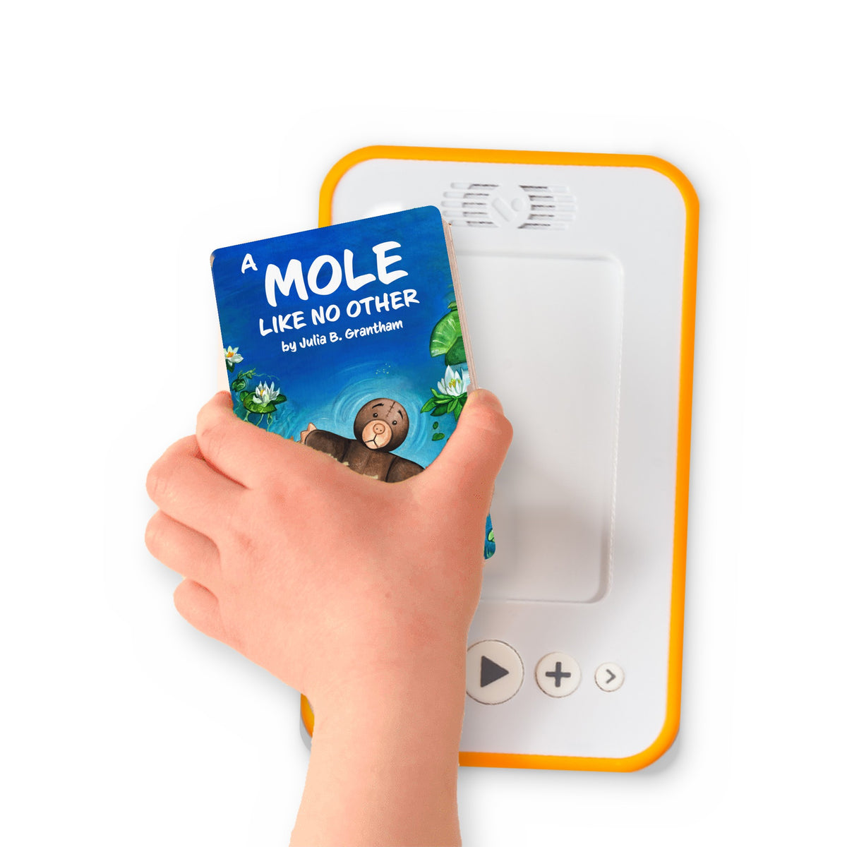 A hand holding the audiobook card for A Mole Like No Other beside a Voxblock audiobook player