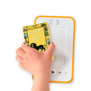 A hand holding the audiobook card for Akimbo and the Lions beside a Voxblock audiobook player