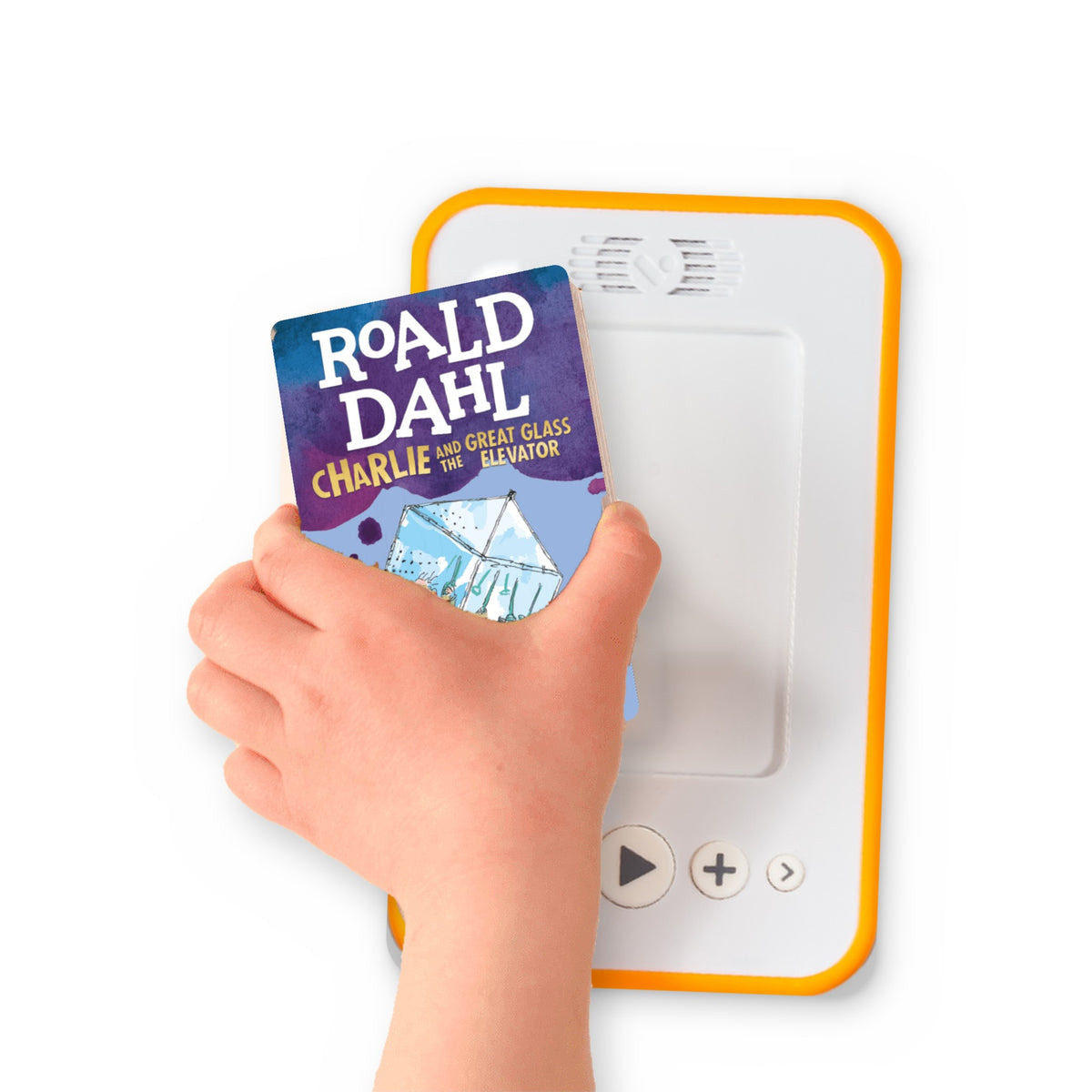 A hand holding the audiobook card for Charlie and the Great Glass Elevator beside a Voxblock audiobook player