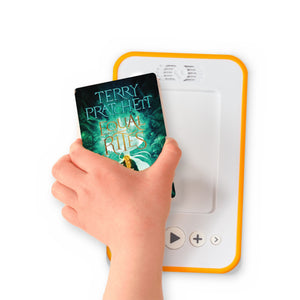 A hand holding the audiobook card for Equal Rites beside a Voxblock audiobook player