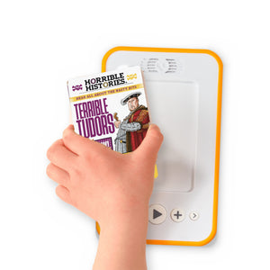 A hand holding the audiobook card for Horrible Histories: Terrible Tudors beside a Voxblock audiobook player