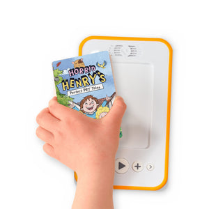 A hand holding the audiobook card for Horrid Henry's Perfect Pet Tales beside a Voxblock audiobook player