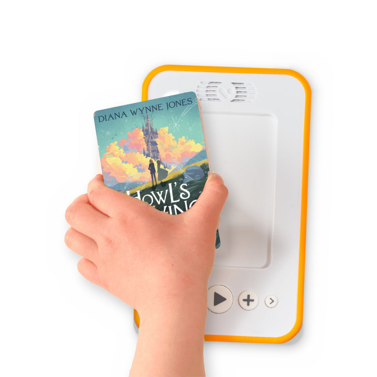 A hand holding the audiobook card for Howl’s Moving Castle beside a Voxblock audiobook player