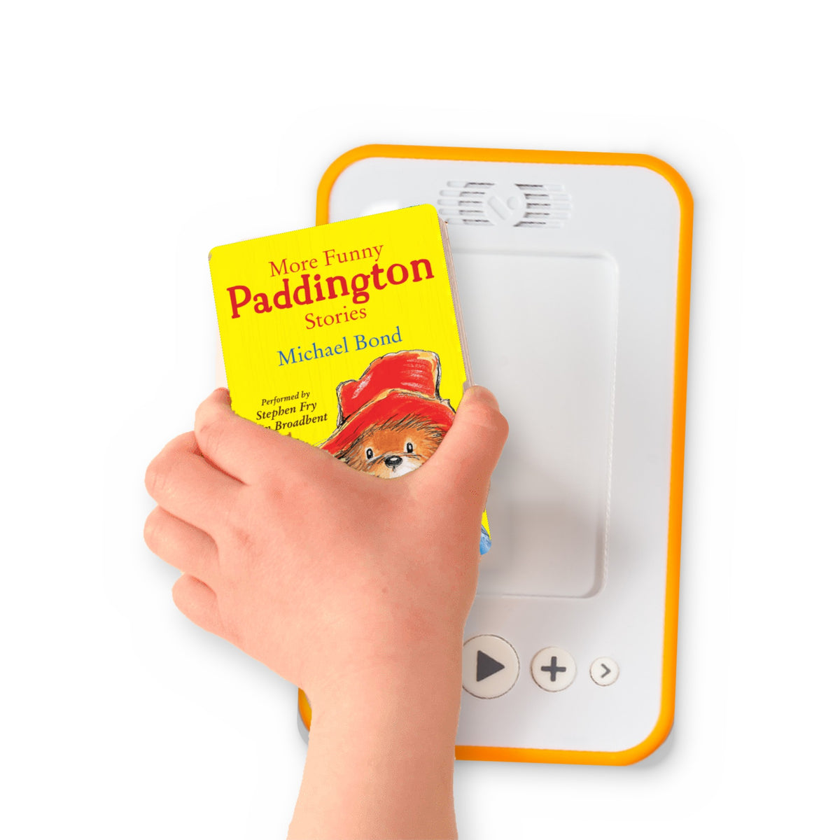 A hand holding the audiobook card for More Funny Paddington Stories beside a Voxblock audiobook player