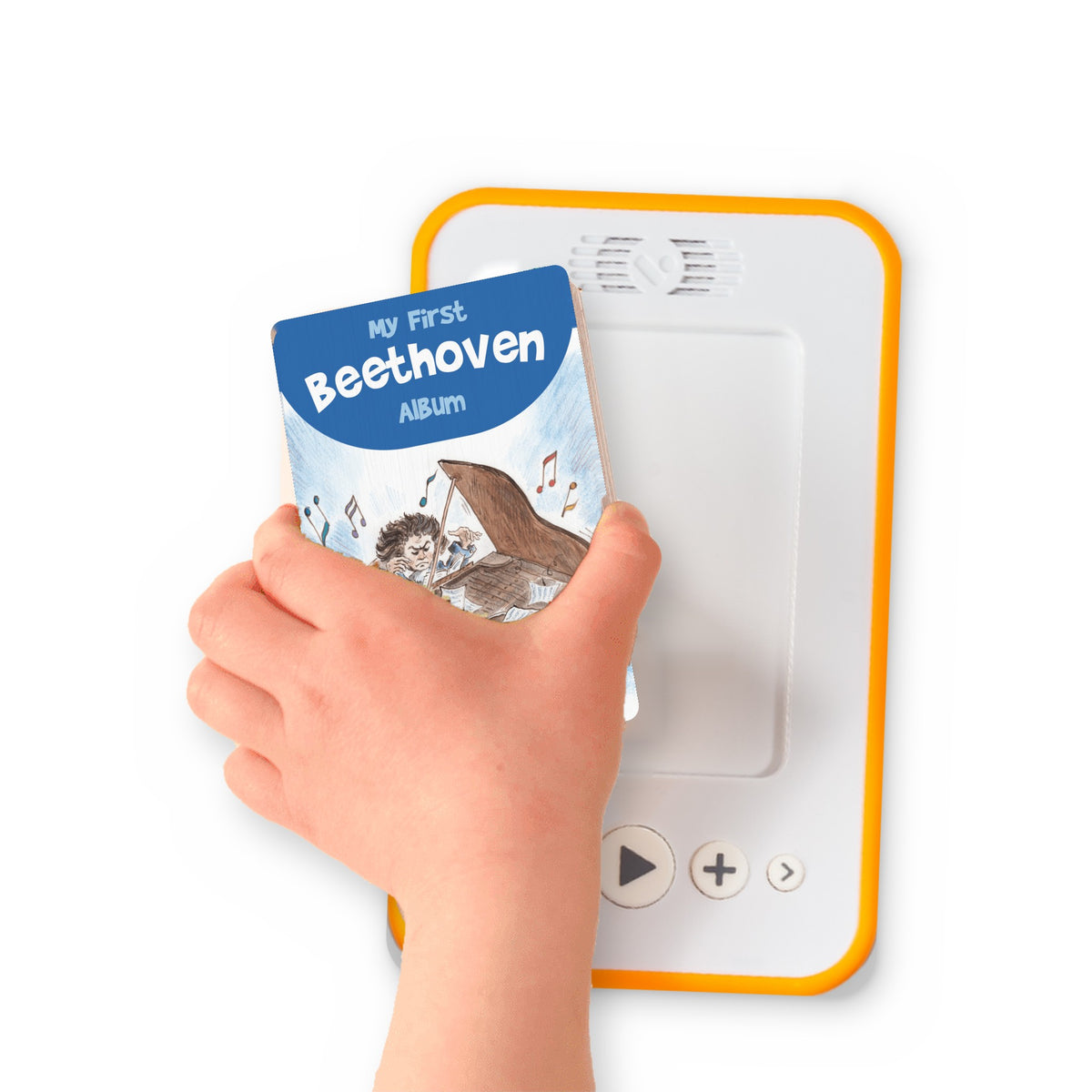 A hand holding the audiobook card for My First Beethoven Album beside a Voxblock audiobook player