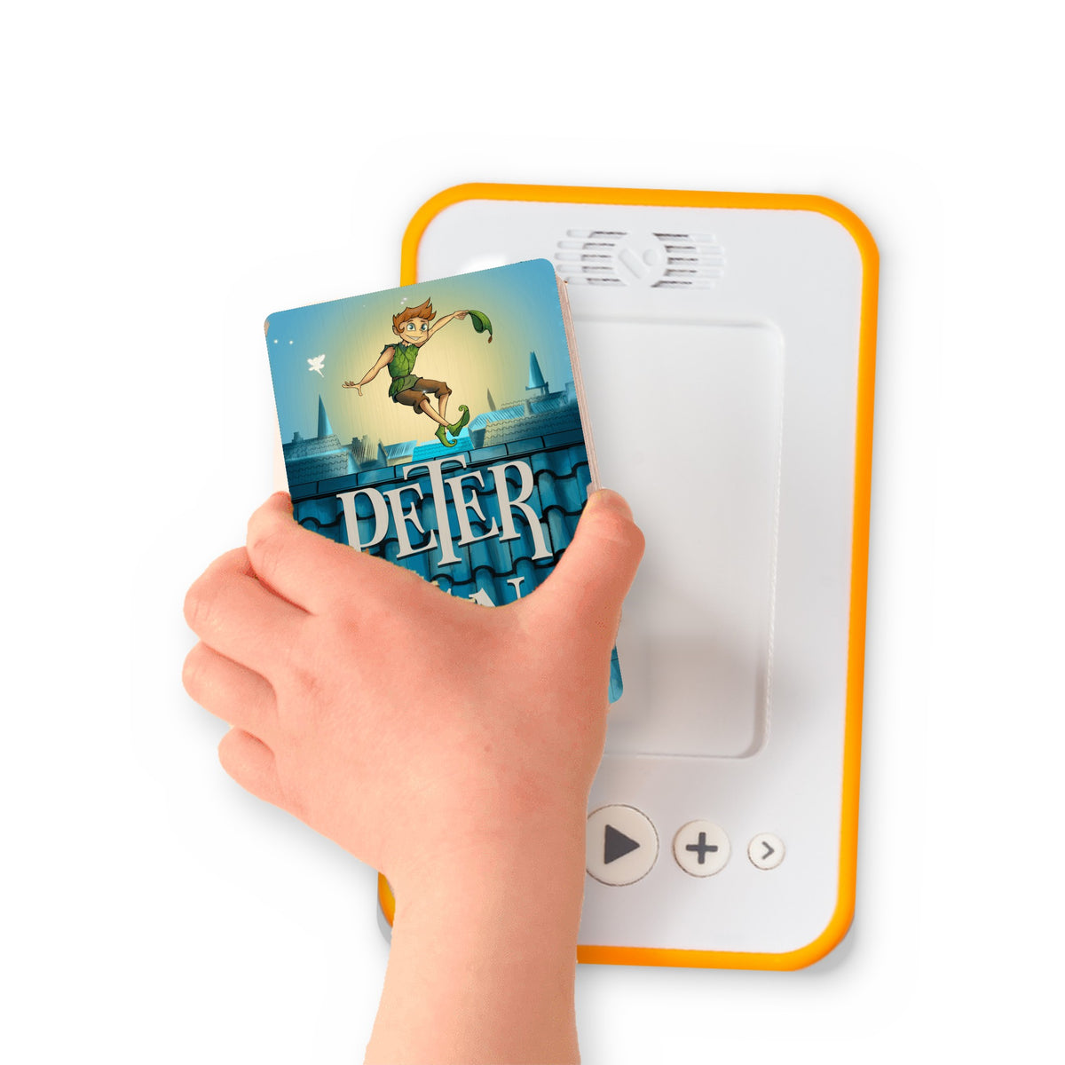 A hand holding the audiobook card for Peter Pan beside a Voxblock audiobook player