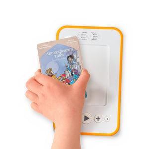 A hand holding the audiobook card for Shakespeare's Tales Retold - Love & Magic beside a Voxblock audiobook player