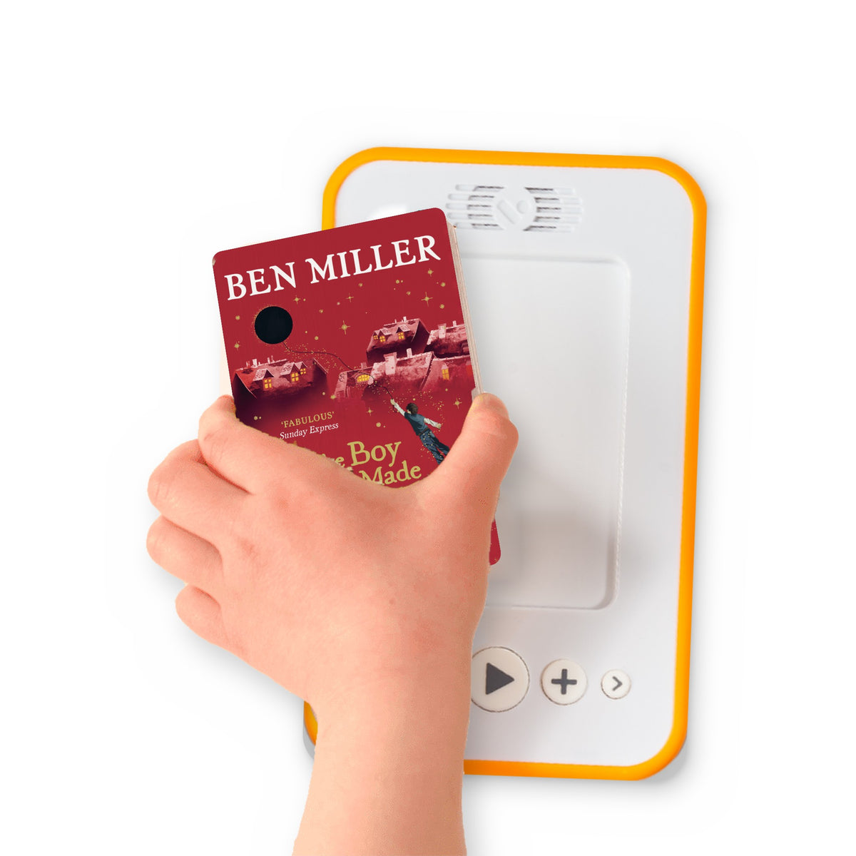 A hand holding the audiobook card for The Boy Who Made the World Disappear beside a Voxblock audiobook player