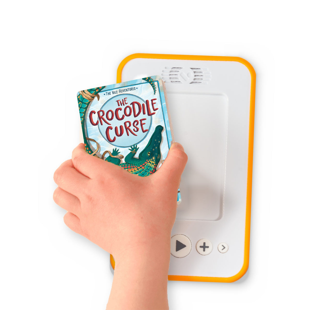 A hand holding the audiobook card for The Crocodile Curse beside a Voxblock audiobook player