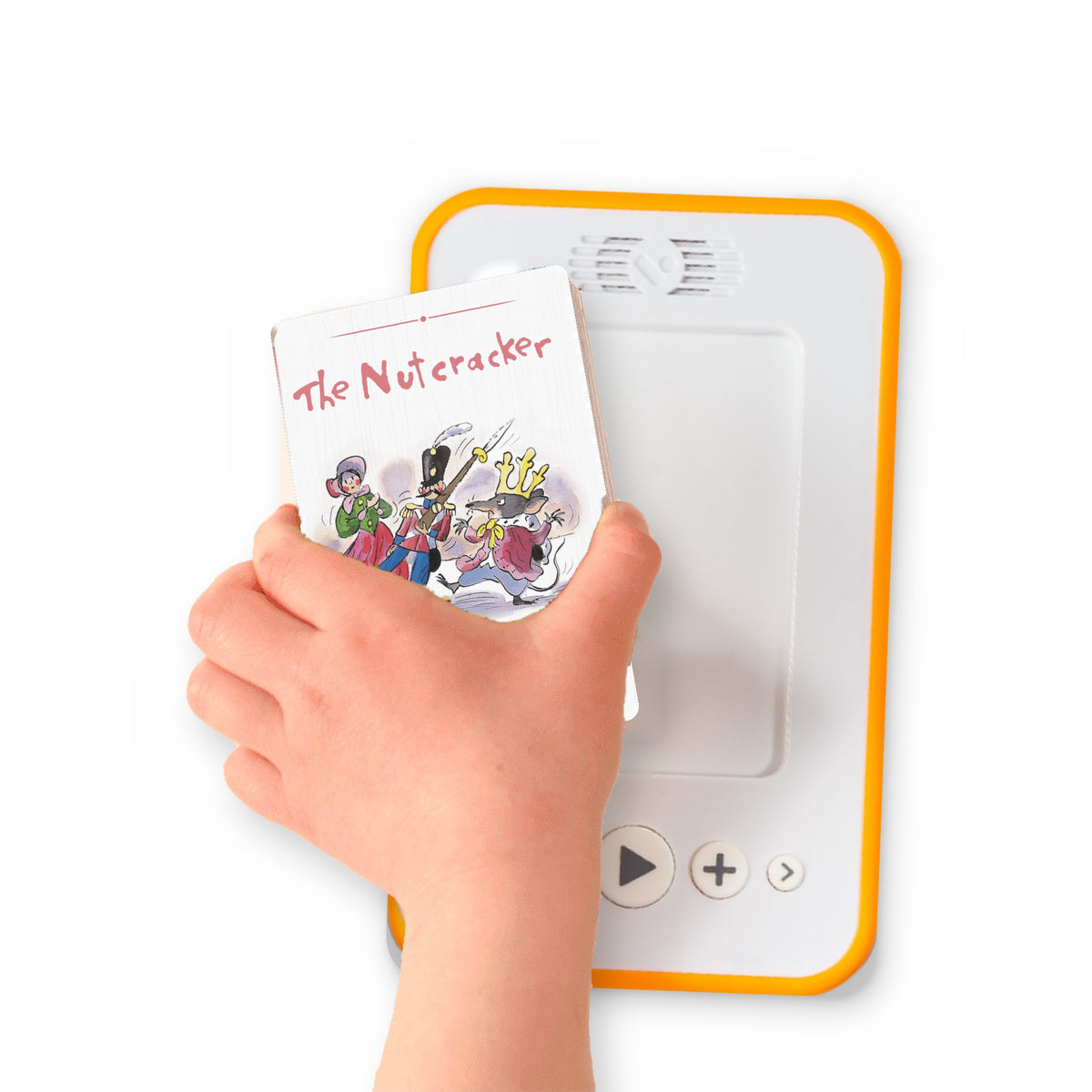 A hand holding the audiobook card for The Nutcracker and Christmas Eve beside a Voxblock audiobook player