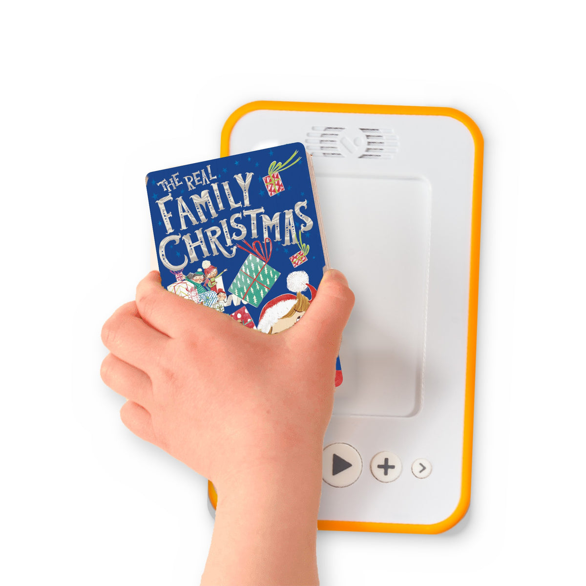 A hand holding the audiobook card for The Real Family Christmas beside a Voxblock audiobook player