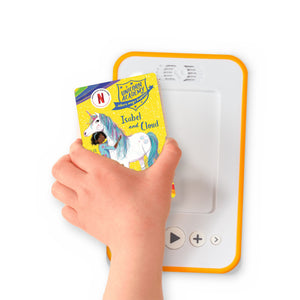 A hand holding the audiobook card for Unicorn Academy: Isabel and Cloud beside a Voxblock audiobook player