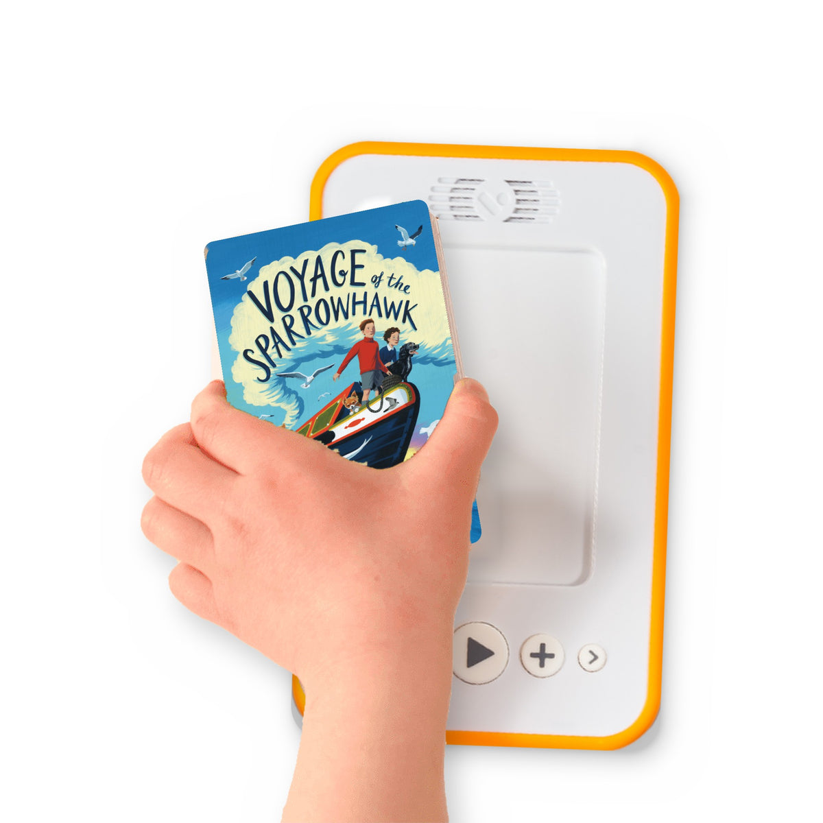 A hand holding the audiobook card for Voyage of the Sparrowhawk beside a Voxblock audiobook player