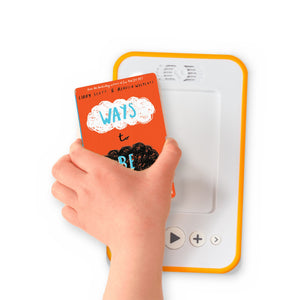 A hand holding the audiobook card for Ways to be me beside a Voxblock audiobook player