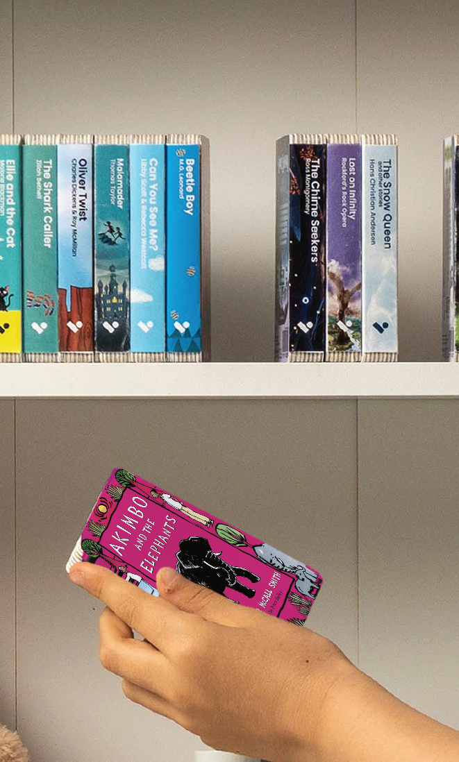 A hand taking the Akimbo and the Elephants audiobook from a shelf of Voxblock audiobooks
