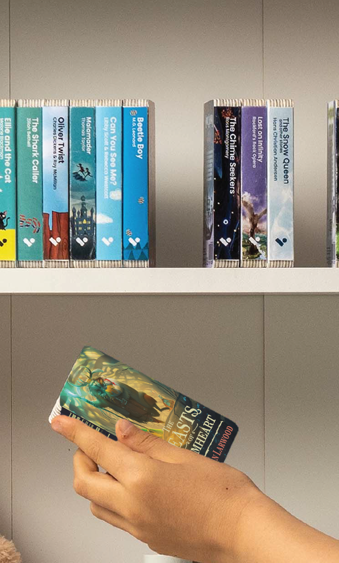 A hand taking The Five Realms: The Beasts of Grimheart audiobook from a shelf of Voxblock audiobooks