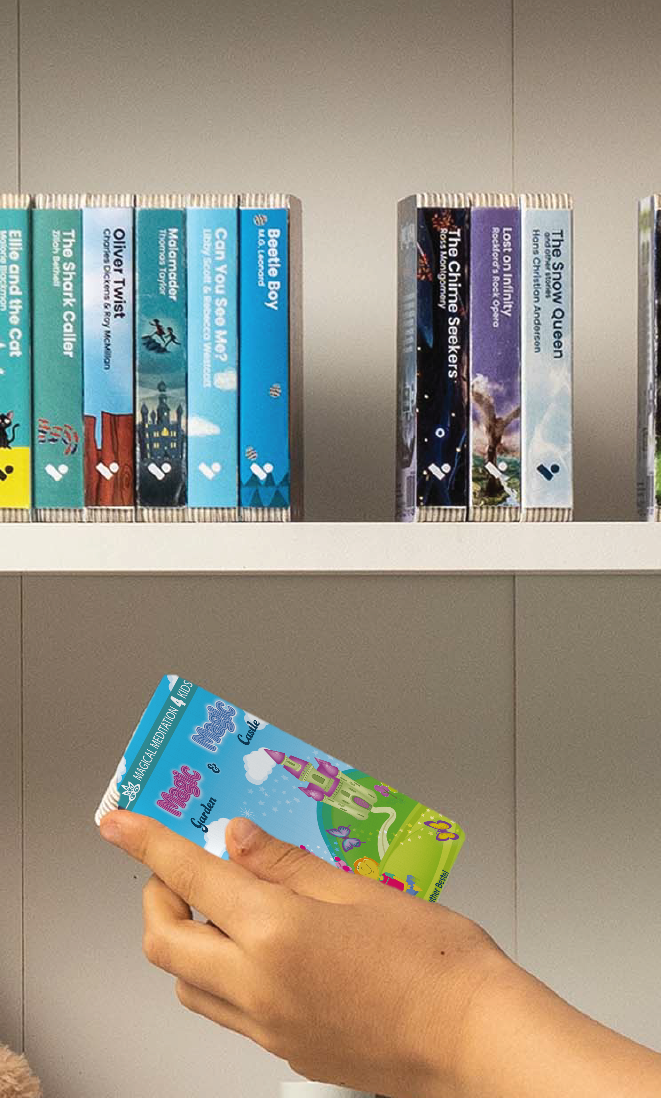A hand taking The Magic Garden & The Magic Castle audiobook from a shelf of Voxblock audiobooks